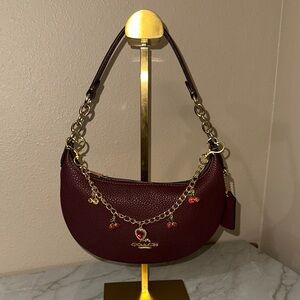 Coach Dark Red Leather Shoulder Bag with Gold Accents